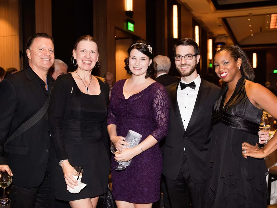 Group of five male and female clinician scholars dressed up for awards celebration.